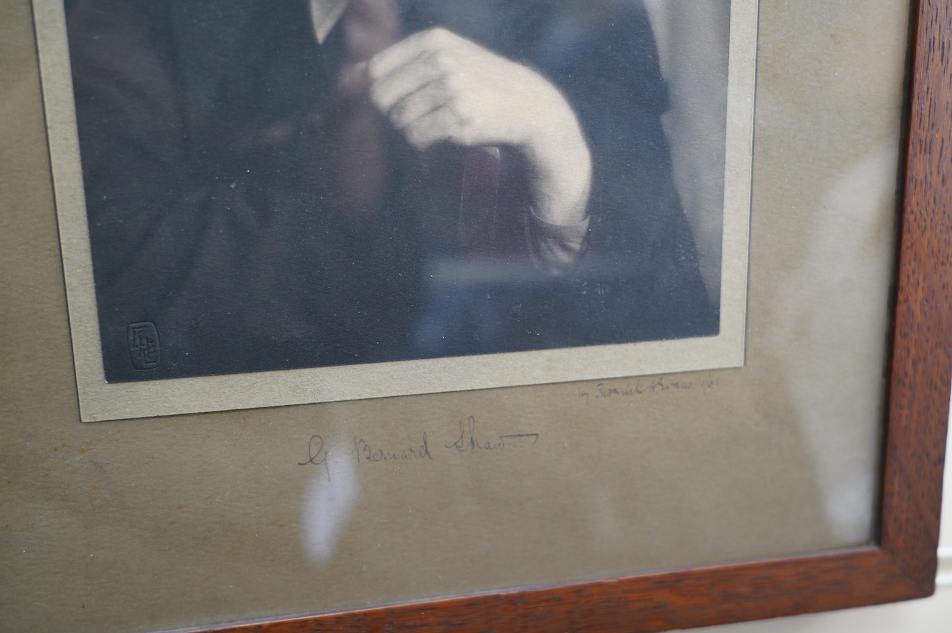 A signed photograph of George Bernard Shaw, also signed by the photographer Frederick H. Evans and dated 1901, in a contemporary oak frame 39 x 31cm, both signatures on the mount. Condition - good